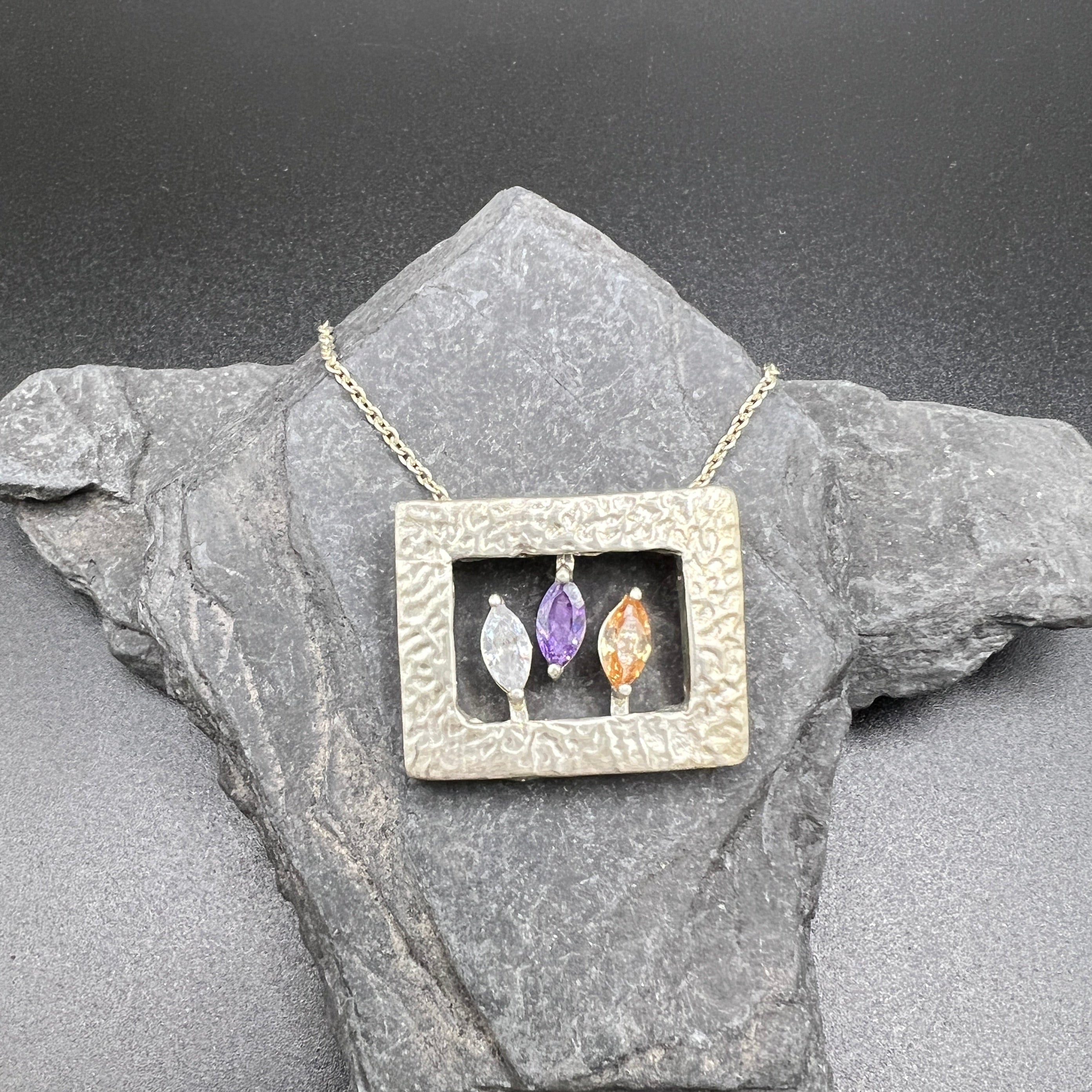 Silberanhaenger Moments